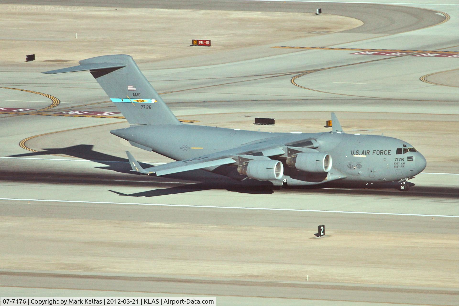 07-7176, 2007 Boeing C-17A Globemaster III C/N P-176, Globemaster III from 436thAW at Dover AFB, was part of the presidential support group while the President was in Las Vegas this day. Globemaster 07-7176 is seen departing RWY 19L on it's trip back east.