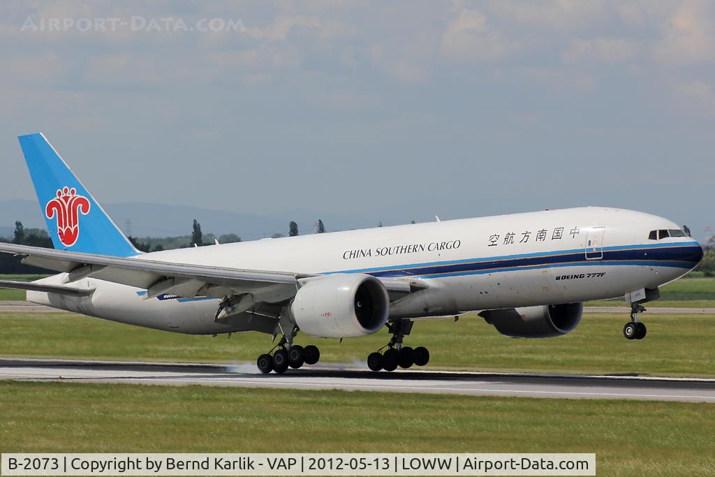 B-2073, 2009 Boeing 777-F1B C/N 37311, Touching down on Rwy 34