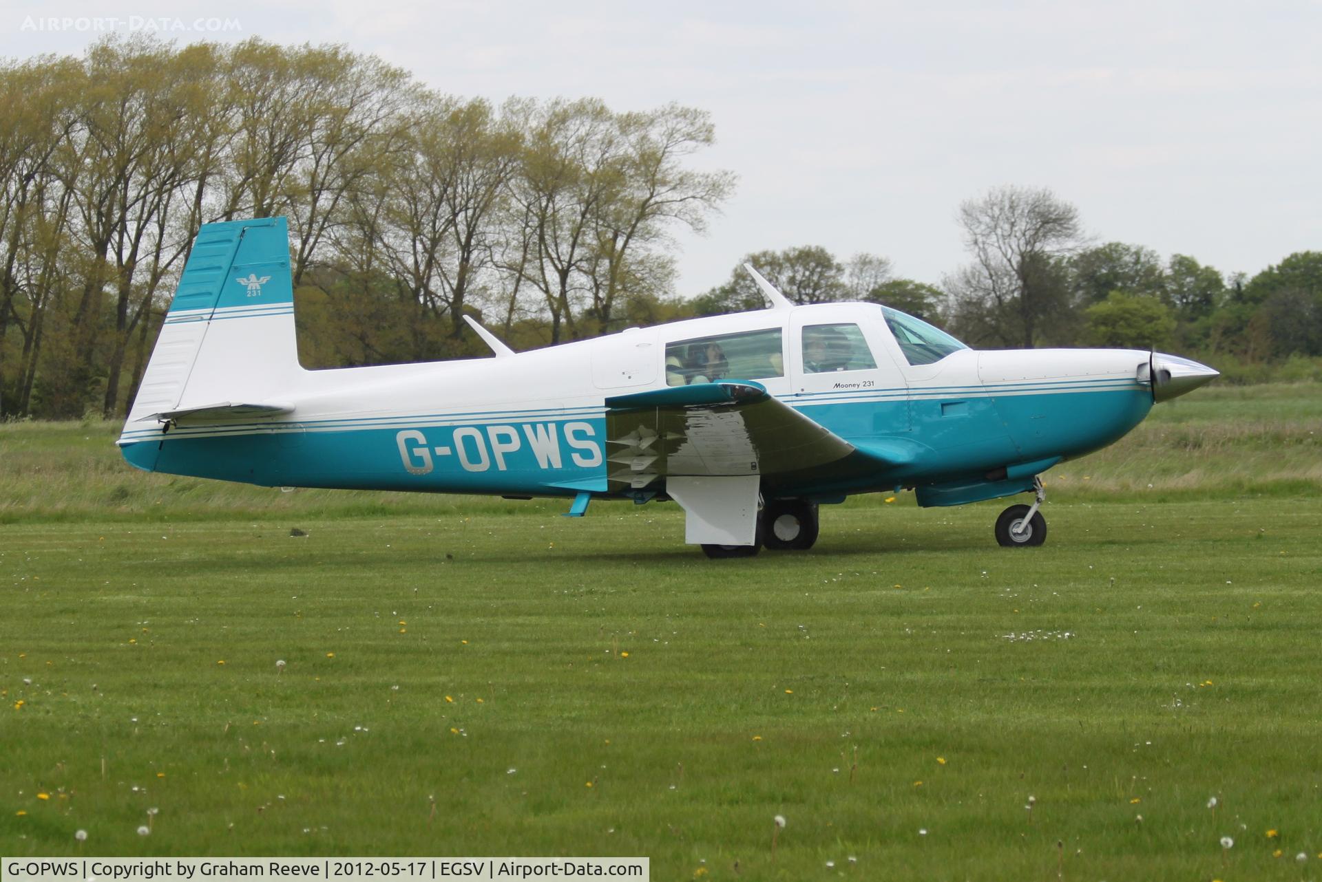 G-OPWS, 1982 Mooney M20K C/N 25-0663, Just landed.