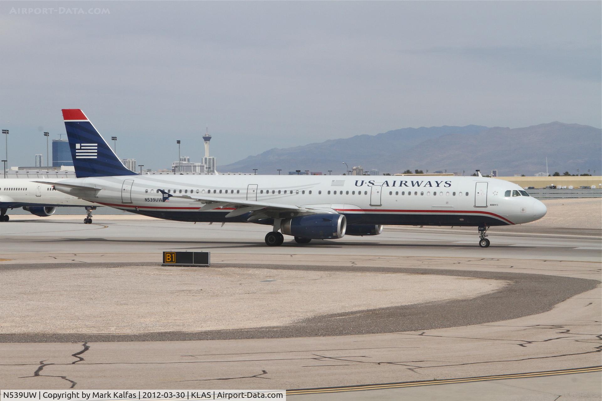 N539UW, 2009 Airbus A321-231 C/N 4082, USAirways Airbus A321-231, AWE1007 on TWY B1 in sequence for a RWY 25R departure to Charlotte-Douglas International/KCLT.