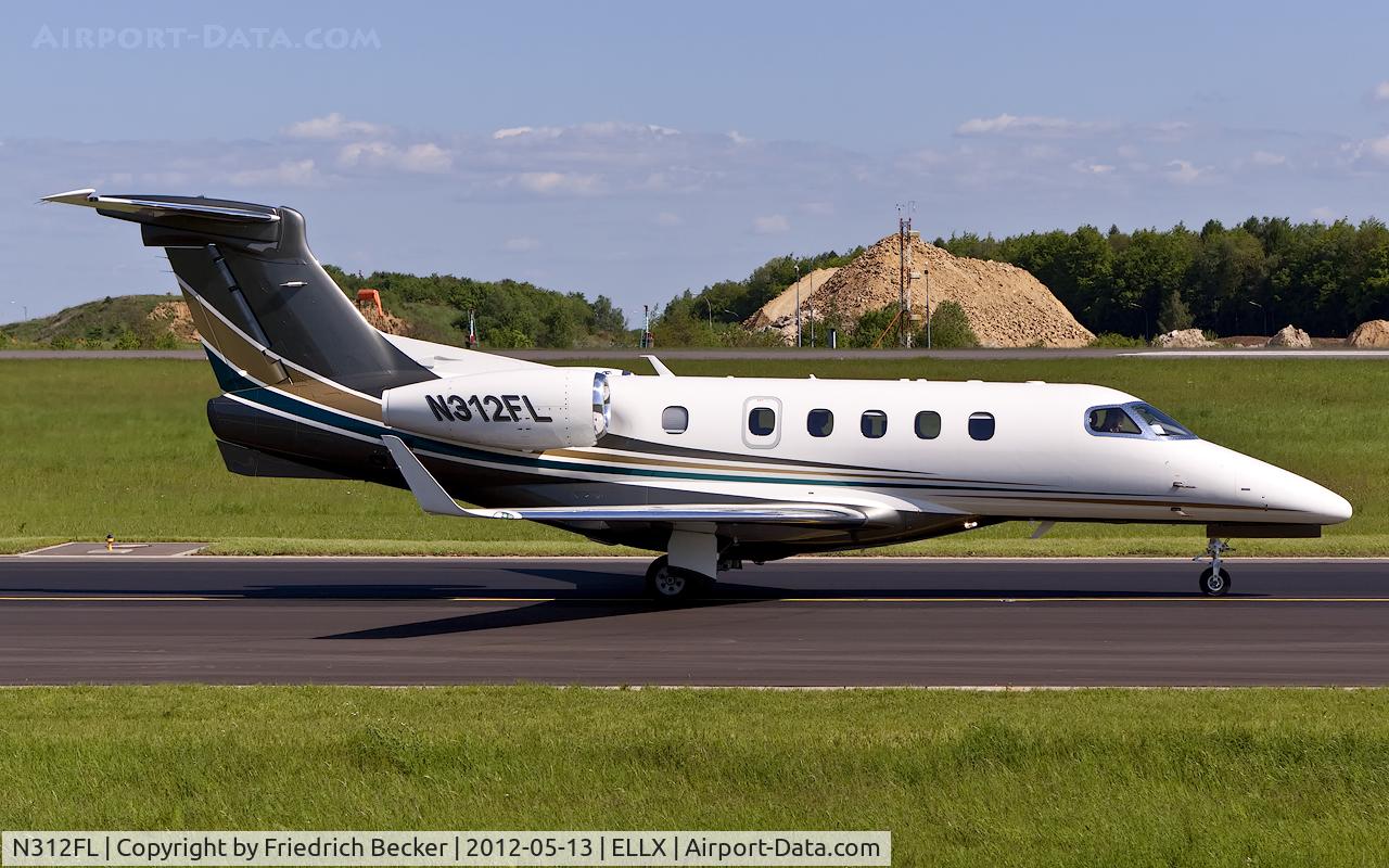 N312FL, 2011 Embraer EMB-505 Phenom 300 C/N 50500037, taxying to the active