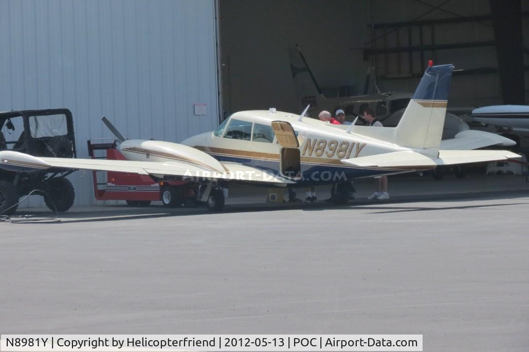 N8981Y, 1972 Piper PA-39-160 Twin Comanche C/R C/N 39-138, Gathered around and discussing at Howard Aviation