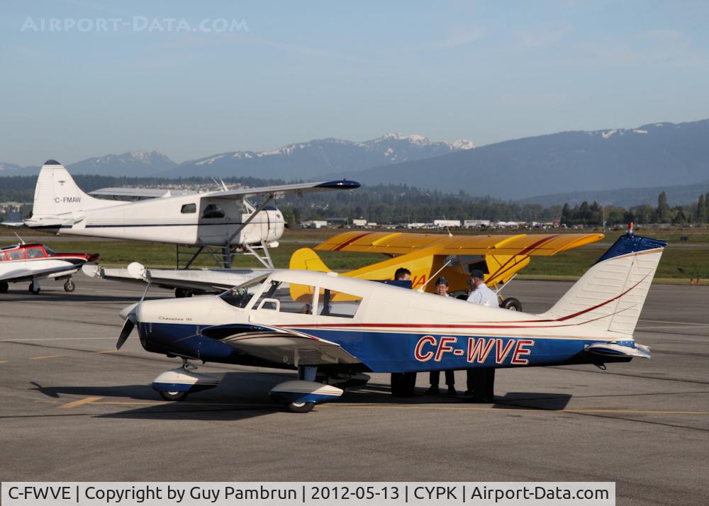 C-FWVE, 1964 Piper PA-28-180 C/N 28-1691, Air Cadets taking part in the pre flight inspection.