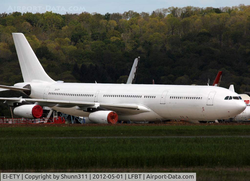 EI-ETY, 1998 Airbus A340-313 C/N 216, Stored in all white c/s no titles... Ex.TC-JIJ from Turkish Airlines...