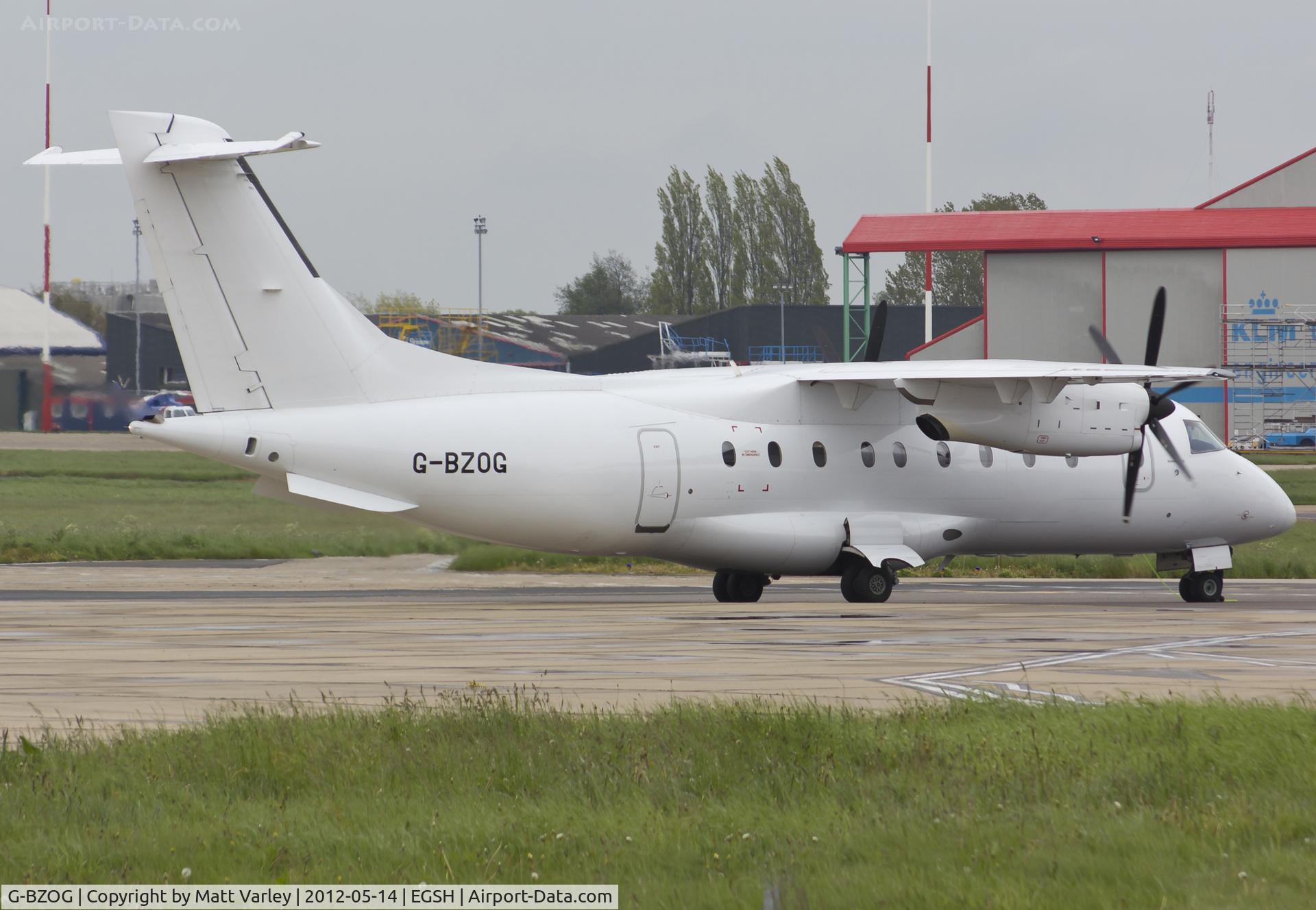 G-BZOG, 1998 Dornier 328-100 C/N 3088, On Push back.