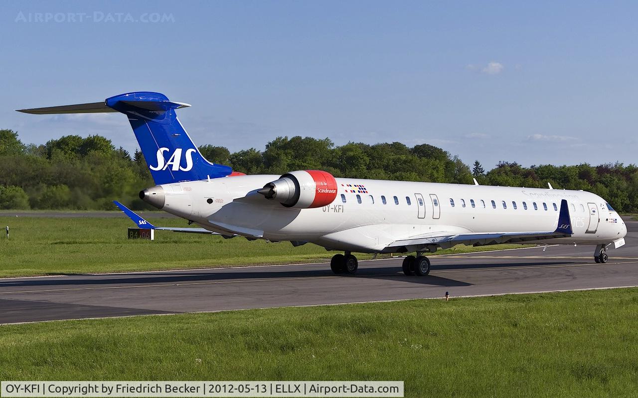 OY-KFI, 2009 Canadair CRJ-900ER (CL-600-2D24) C/N 15242, holding point RW06