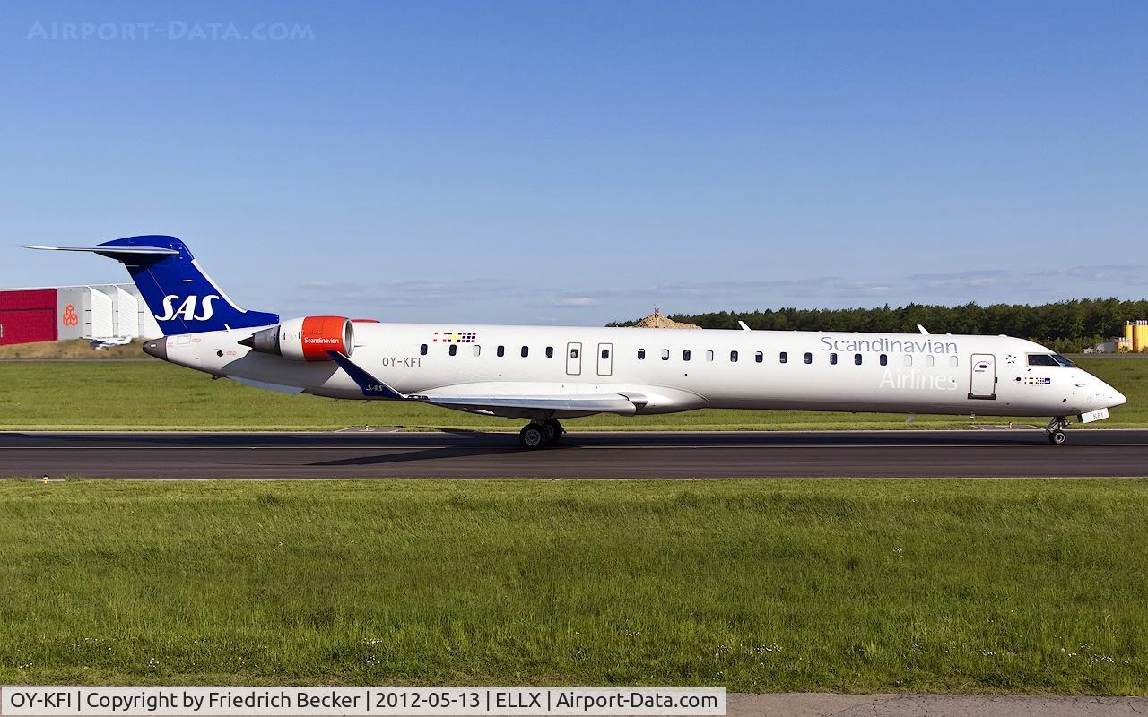 OY-KFI, 2009 Canadair CRJ-900ER (CL-600-2D24) C/N 15242, taxying to the active