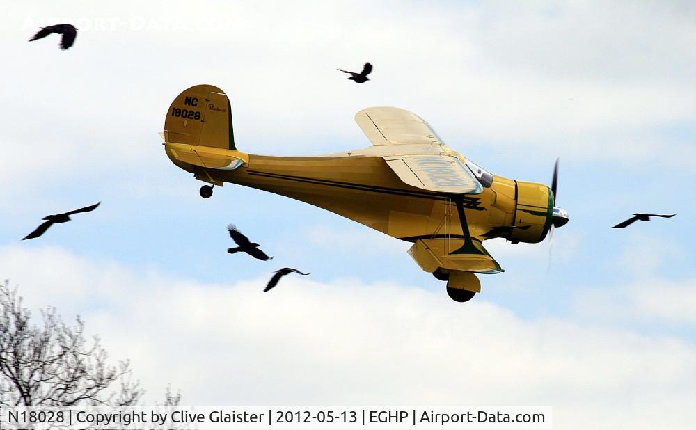 N18028, 1937 Beech D17S Staggerwing C/N 147, Just showing a few birds that appeared, reminds me of the Alfred Hitchcock film 