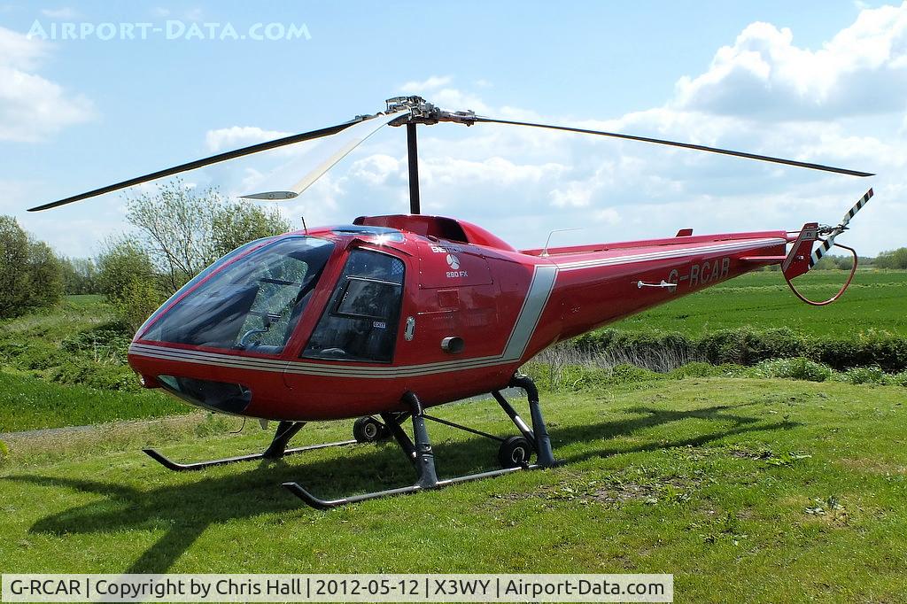G-RCAR, 1986 Enstrom 280FX Shark C/N 2012, at the Staffordshire Heliport. Wychnor