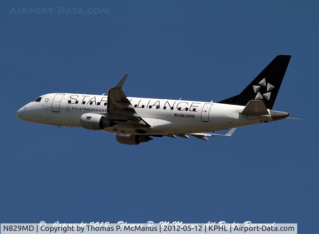 N829MD, 2005 Embraer 170SU (ERJ-170-100SU) C/N 17000049, Republic Airlines ERJ-170, displaying Star Alliance livery dba US Airways Express, climbing out from 27L at PHL.