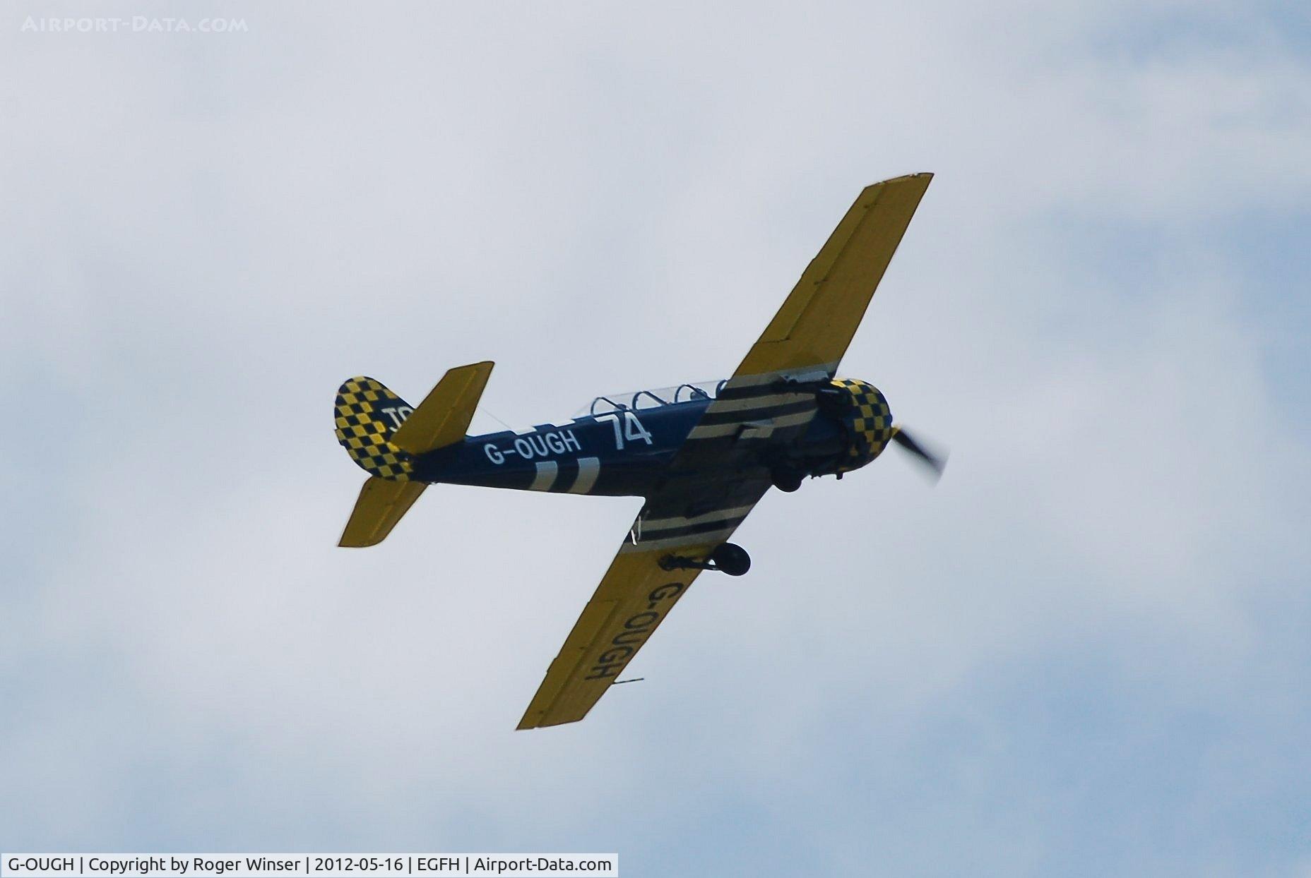 G-OUGH, 1987 Bacau Yak-52 C/N 877404, Run and break over Runway 28. Marked 62/IV on port side.