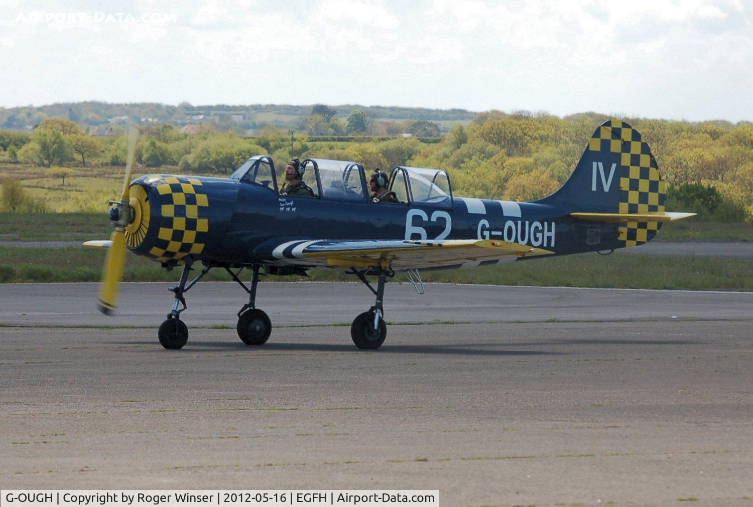 G-OUGH, 1987 Bacau Yak-52 C/N 877404, Visiting Yak-52. Marked 74/JA on starboard side.