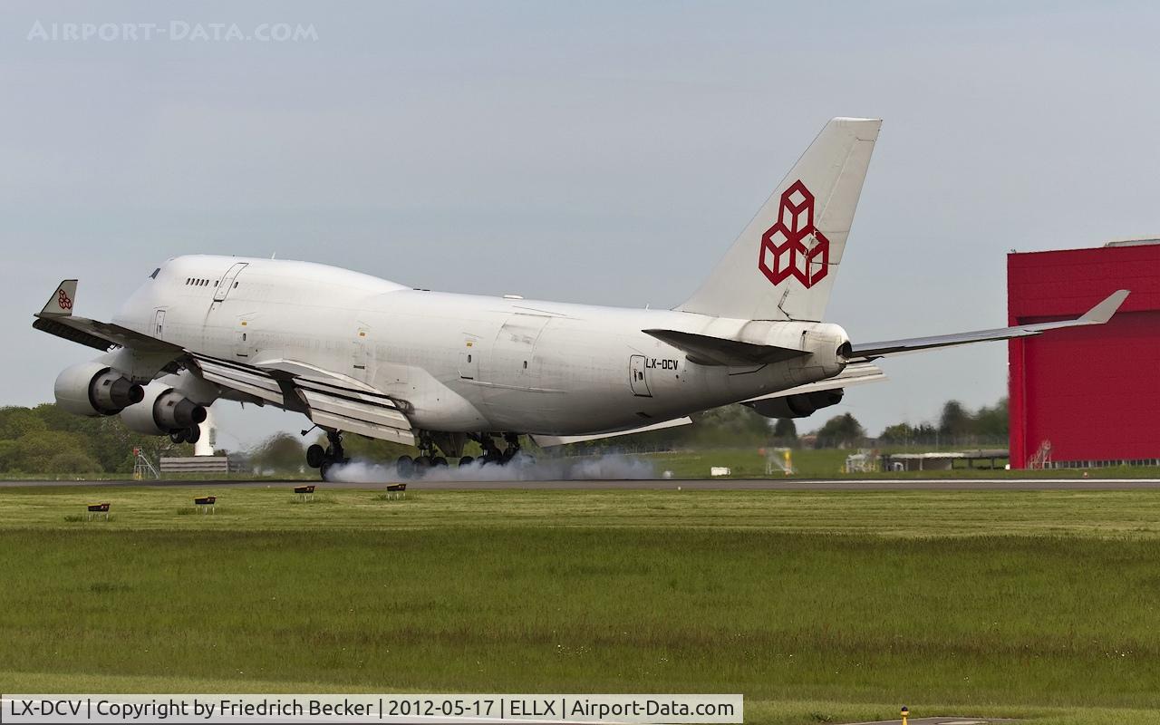 LX-DCV, 1990 Boeing 747-4B5F/SCD C/N 24619, touchdown RW06