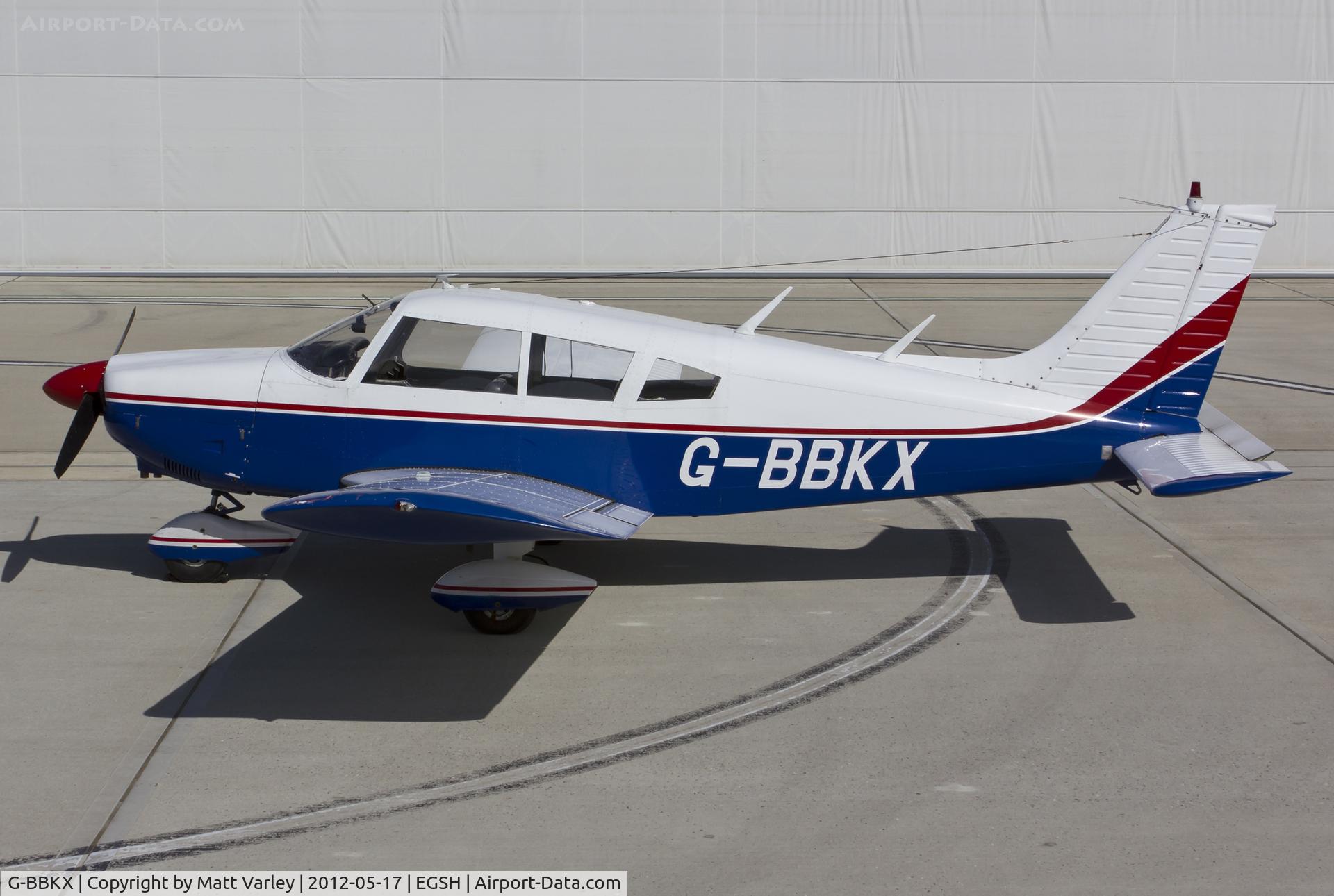G-BBKX, 1973 Piper PA-28-180 Cherokee Challenger C/N 28-7305581, Sat on stand at SaxonAir.