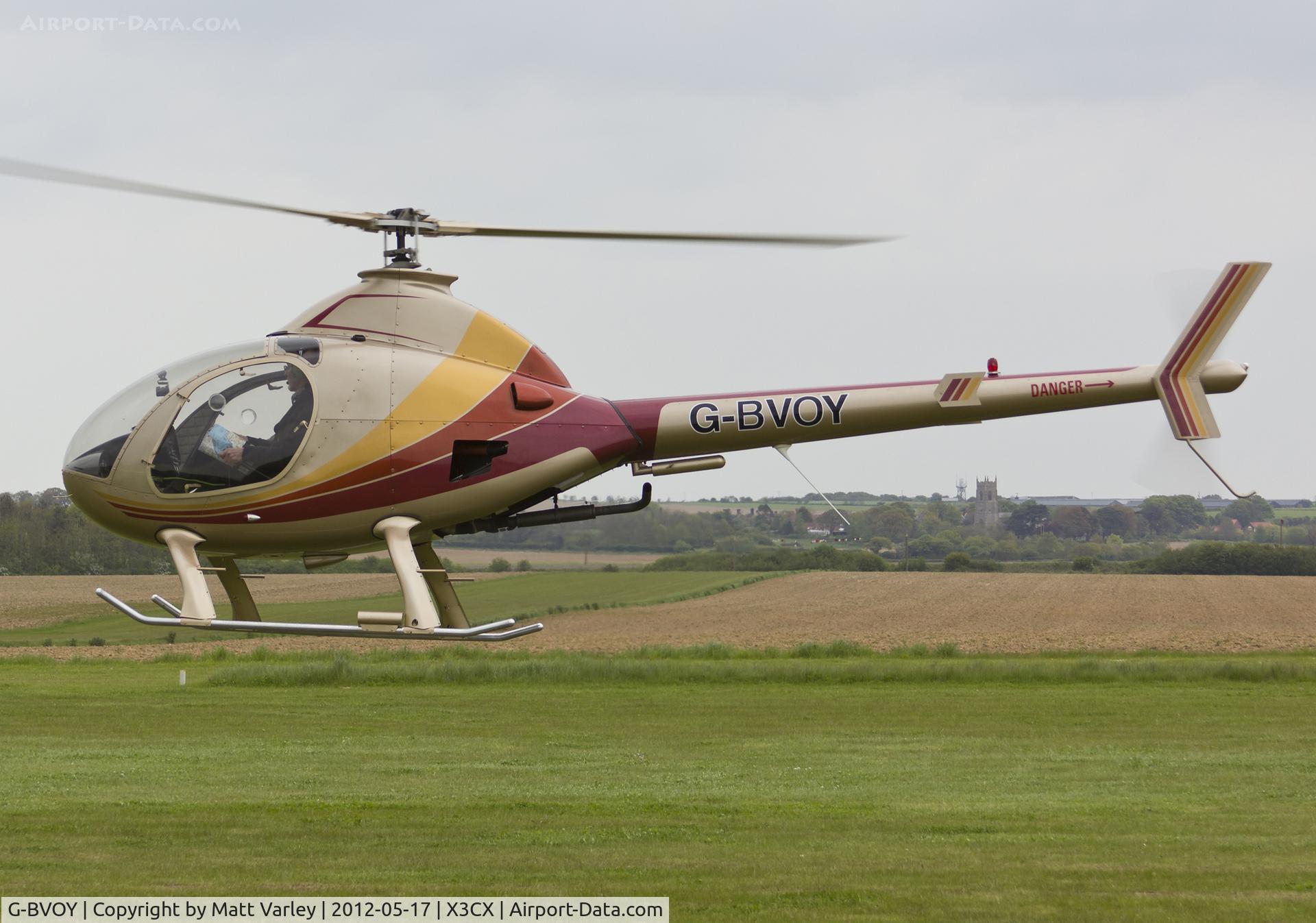 G-BVOY, 1993 Rotorway Exec 90 C/N 5238, Departing Northrepps after a fuel stop.