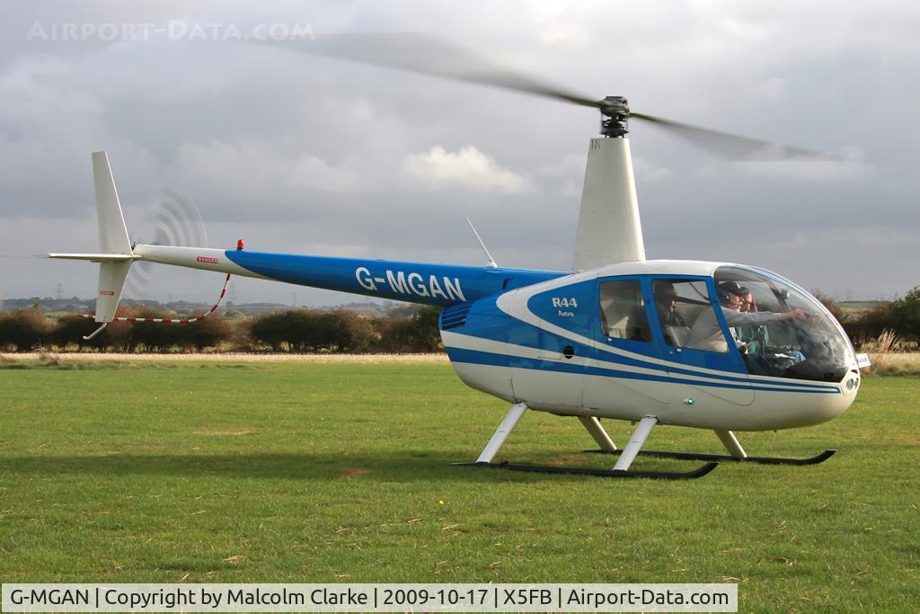 G-MGAN, 1999 Robinson R44 C/N 0588, Robinson R44 Astro, Fishburn, October 2009.