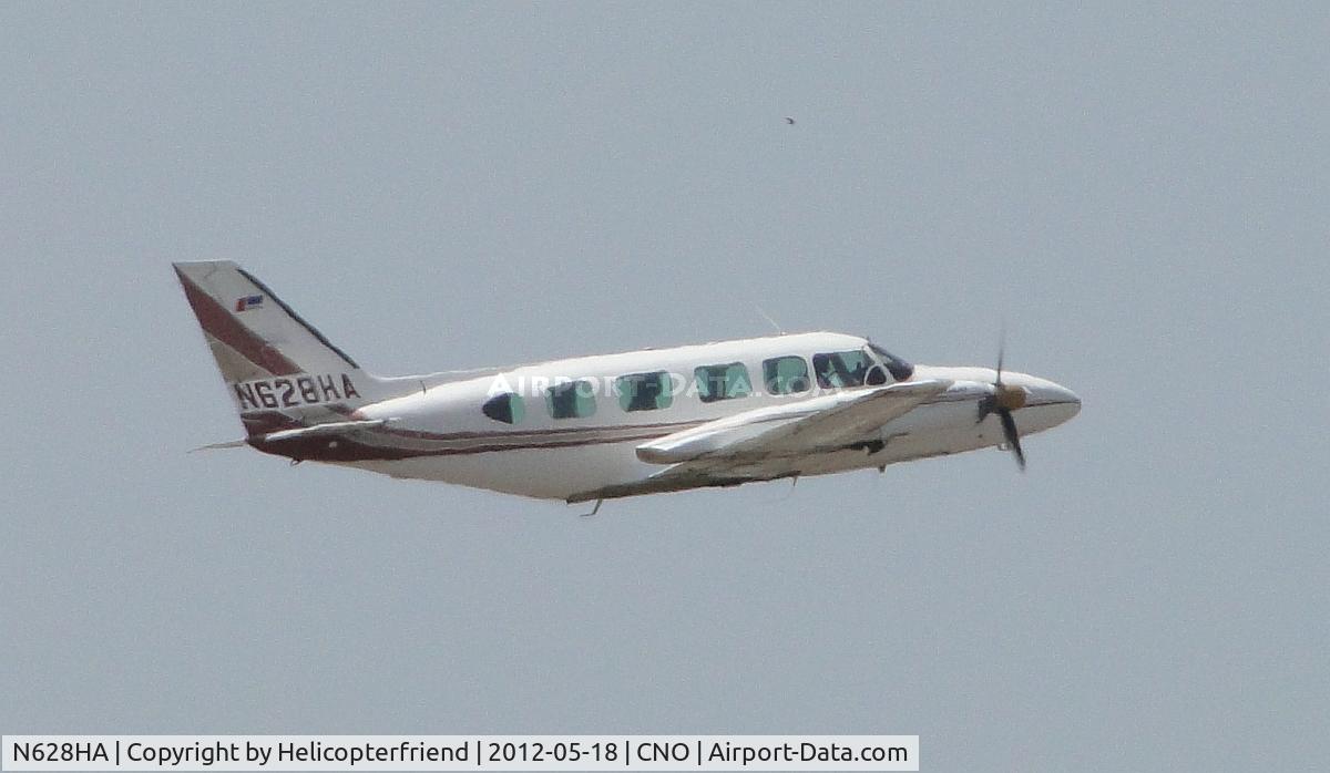 N628HA, 1979 Piper PA-31-350 Chieftain C/N 31-7952085, Landing gear retracted and headed out westbound