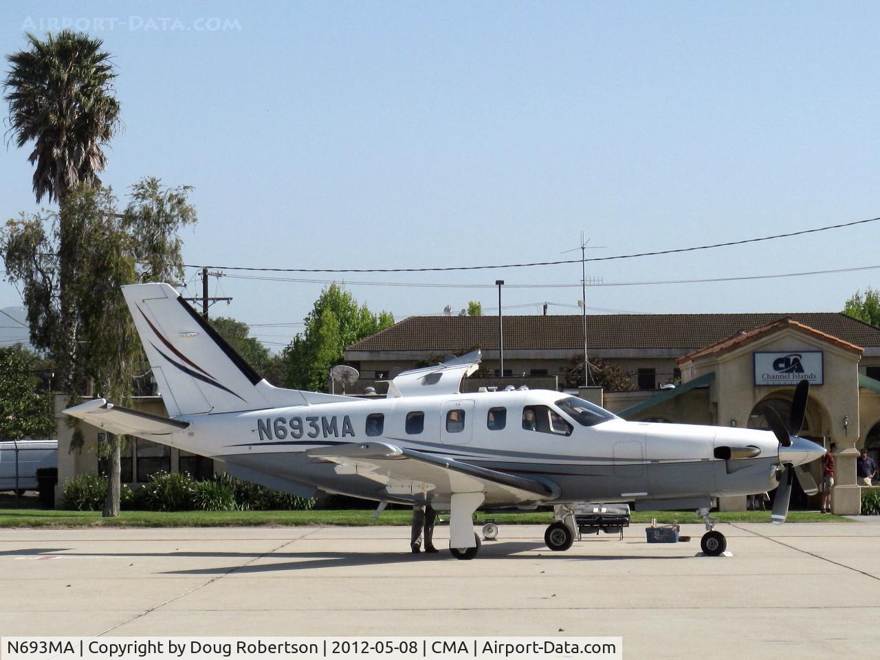 N693MA, 2004 Socata TBM-700 C/N 293, 2004 SOCATA TBM 700, P&W(C)PT6A-64 turboprop 1,570 shp flat rated at 700 shp, unloading on ramp