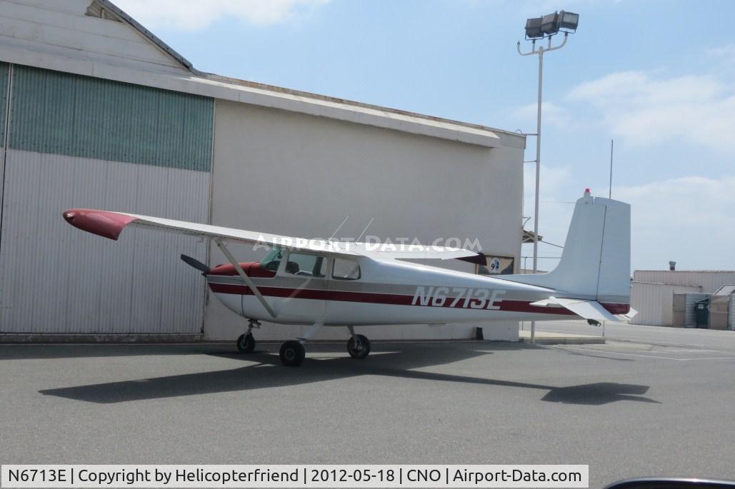 N6713E, 1959 Cessna 175 Skylark C/N 56213, Parked next to a hanger