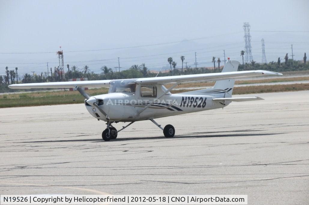 N19526, 1973 Cessna 150L C/N 15074471, Tied down and parked south of the Tower