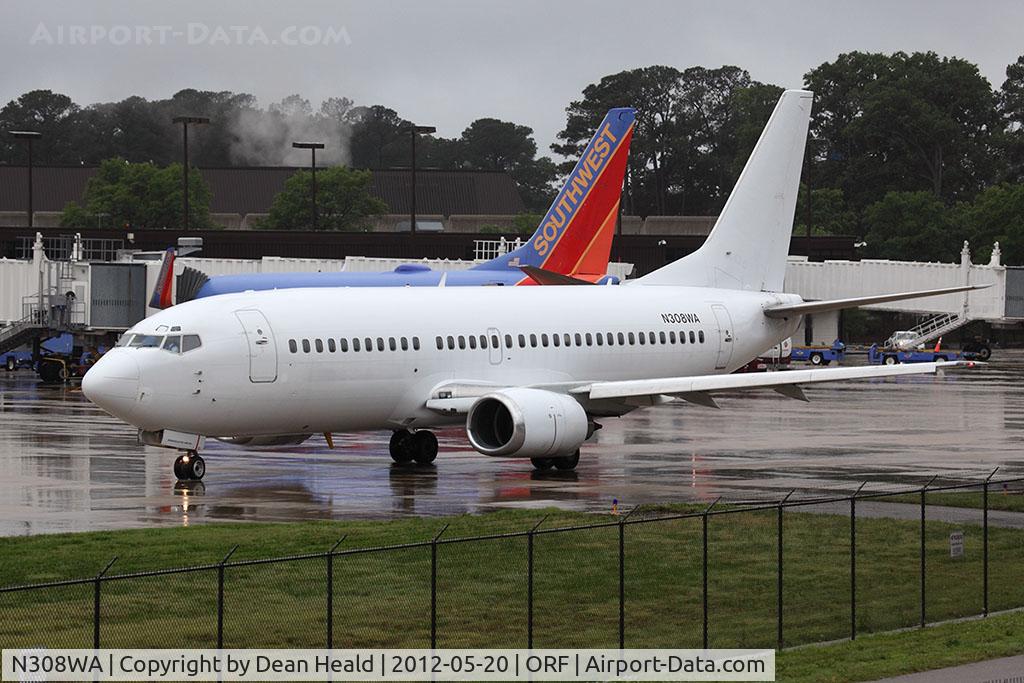 N308WA, 1986 Boeing 737-347 C/N 23441, The female co-pilot was as sharp as a tack when she read back her flight plan with clearance delivery. SkyKing Airlines N308WA seen here taxiing from the gate for departure to Atlantic City (KACY) as 