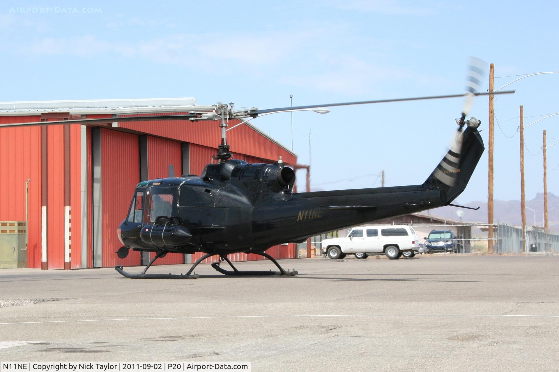 N11NE, 2001 Bell UH-1B C/N 63-13086, Taking off after fuel