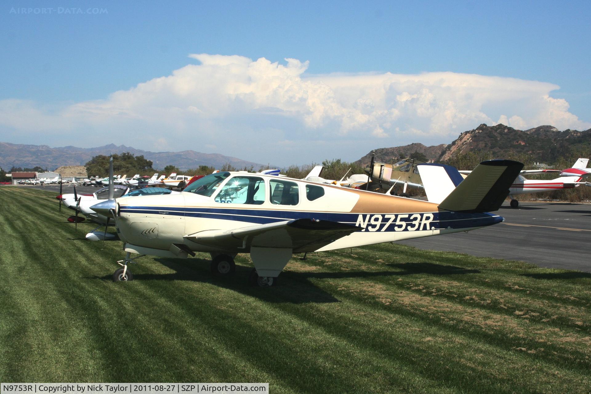 N9753R, 1960 Beech M35 Bonanza C/N D-6241, Parked on the grass