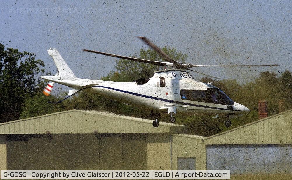 G-GDSG, 2005 Agusta A-109E Power C/N 11656, Originally owned to, Pendley Aviation LLP in November 2005 and currently owned to & Trading as, Pendley Farm since February 2011. Departing in dusty conditions!!