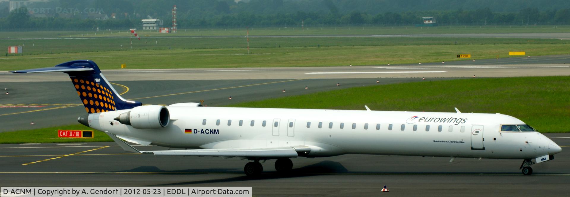D-ACNM, 2010 Bombardier CRJ-900LR (CL-600-2D24) C/N 15253, Eurowings (LH-Regional cs.), is taxiing for departure at Düsseldorf Int´l (EDDL)
