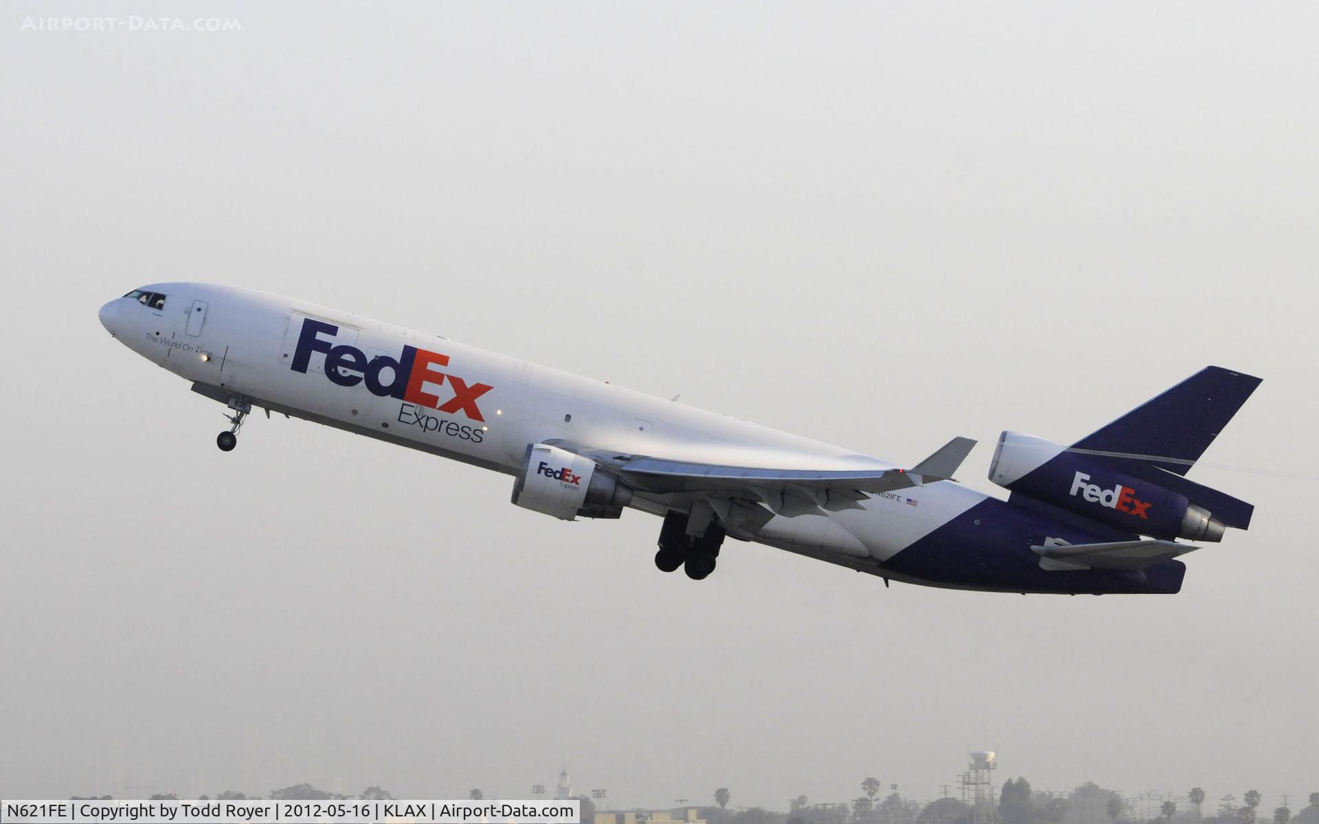 N621FE, 1999 McDonnell Douglas MD-11F C/N 48792, Departing LAX on 25R