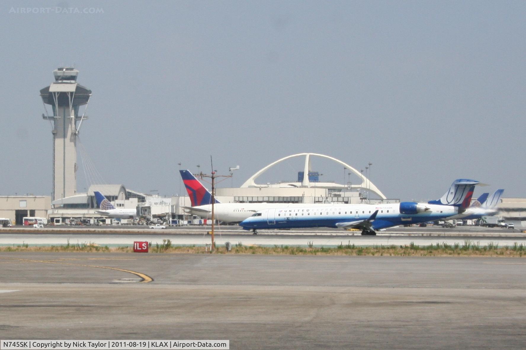N745SK, 2005 Bombardier CRJ-701ER (CL-600-2C10) Regional Jet C/N 10201, Rollout 25L