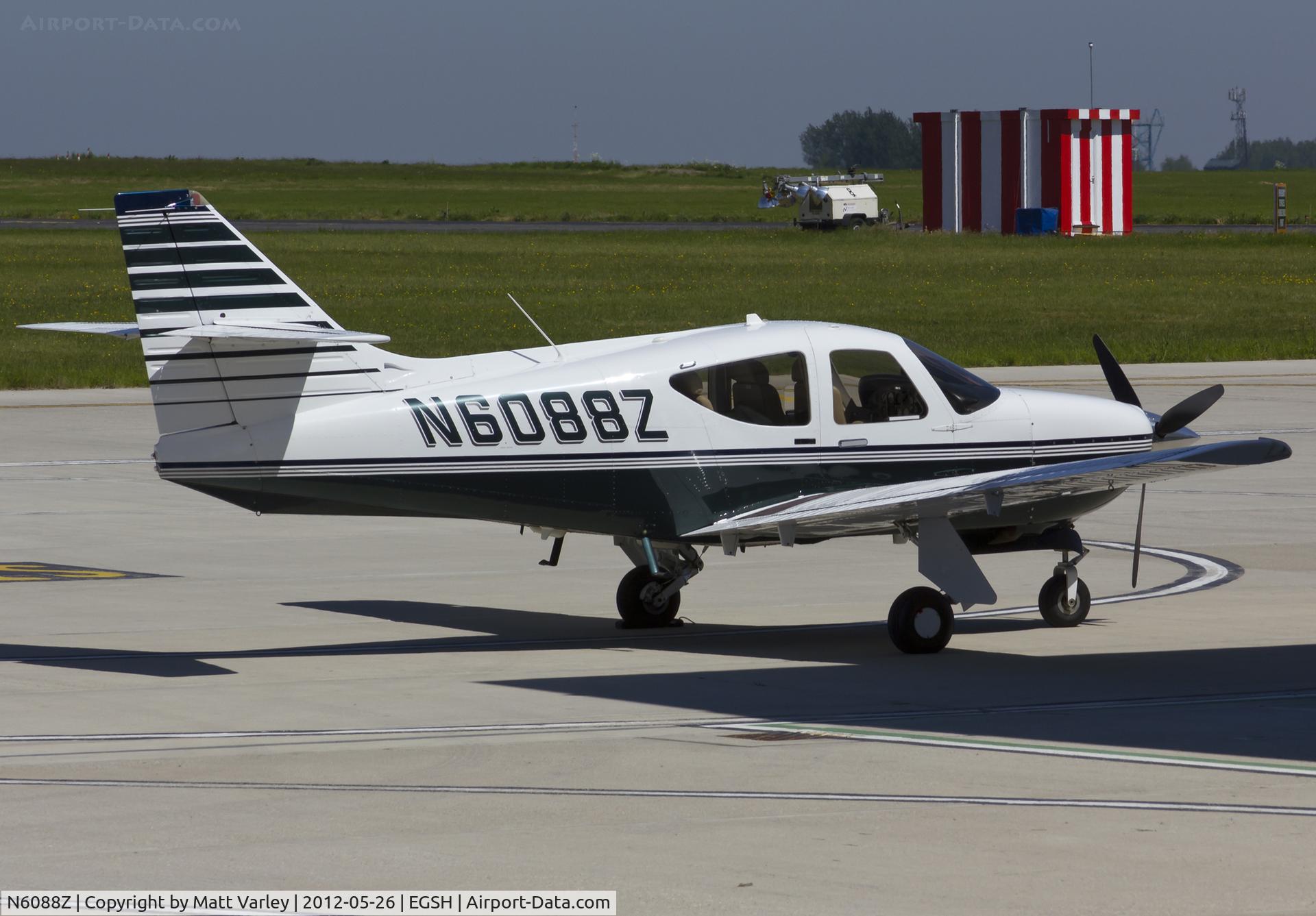N6088Z, 1999 Rockwell Commander 114B C/N 14662, Sat on stand at SaxonAir.