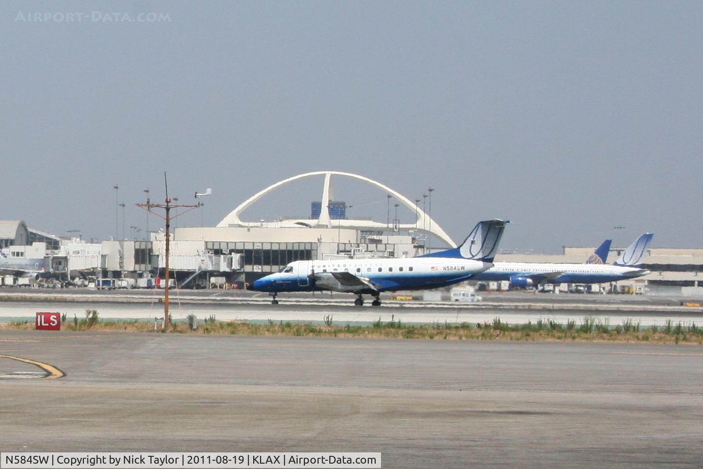 N584SW, 1999 Embraer EMB-120ER Brasilia C/N 120352, Rolling out 25L