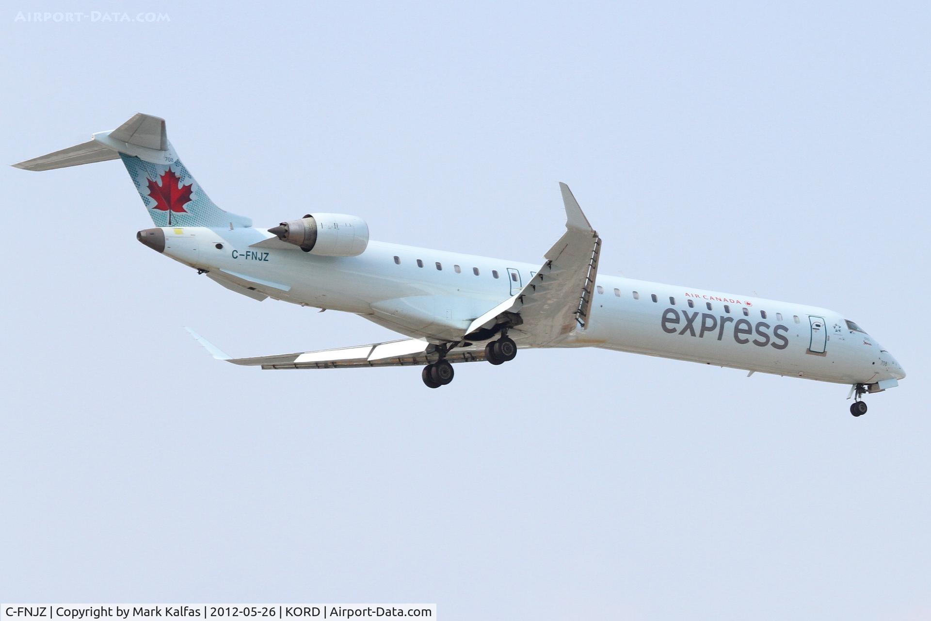 C-FNJZ, 2005 Canadair CRJ-705ER (CL-600-2D15) Regional Jet C/N 15046, Jazz Aviation/Air Canada Express Canadair CL-600-2D15 Regional Jet CRJ-705ER, JZA665	arriving from Toronto Pearson Int'l /CYYZ, RWY 10 approach KORD.