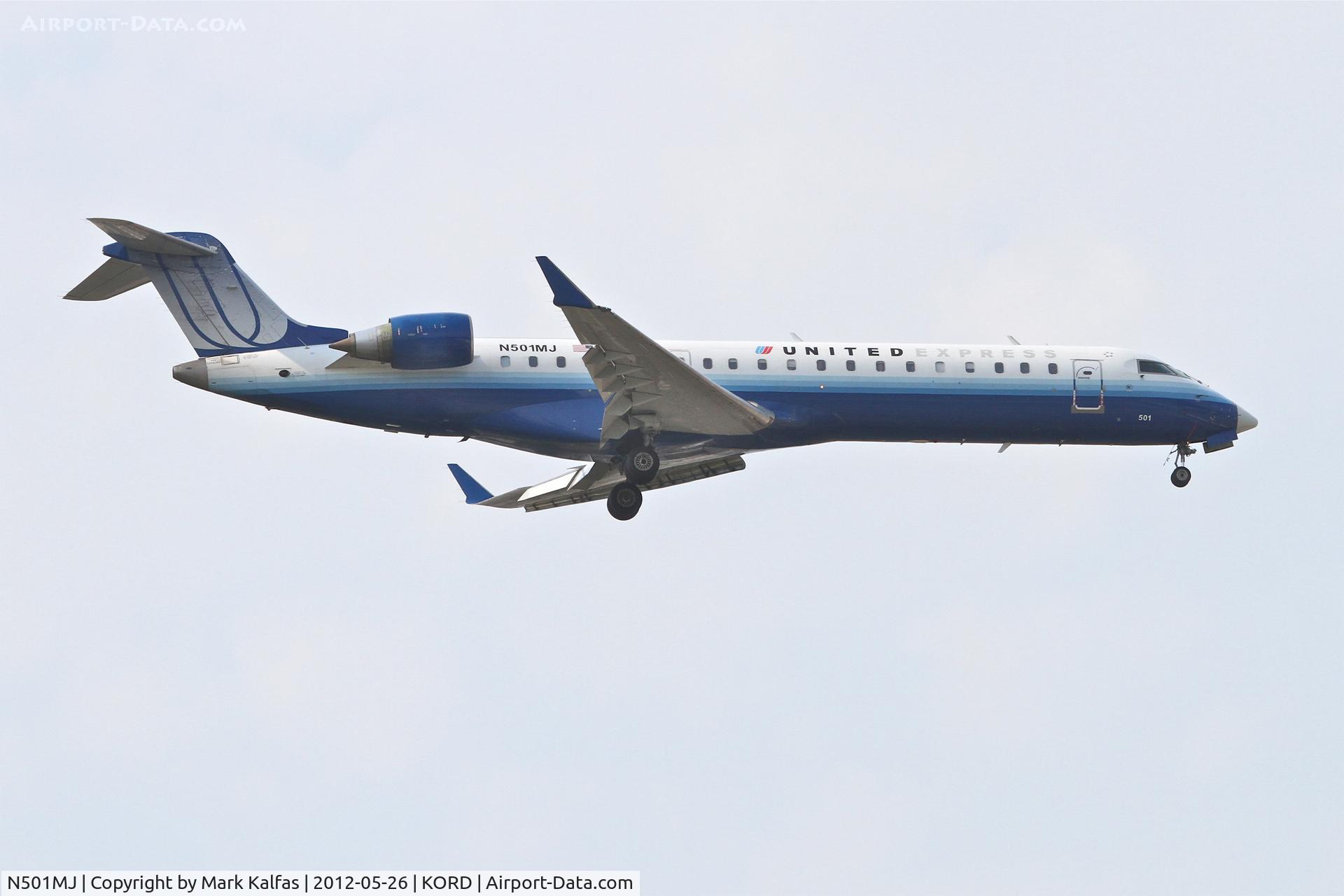 N501MJ, 2002 Canadair CL-600-2C10 Regional Jet CRJ-700 C/N 10047, Mesa Airlines/United Express Bombardier CL-600-2C10, ASH3760 arriving from Buffalo Niagara Intl/KBUF, RWY 10 approach KORD.
