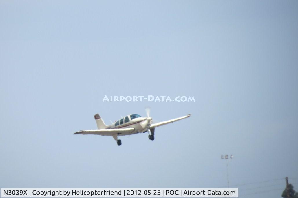 N3039X, 1987 Beech F33A Bonanza C/N CE-1138, Lifting off from 26L landing gear still extended