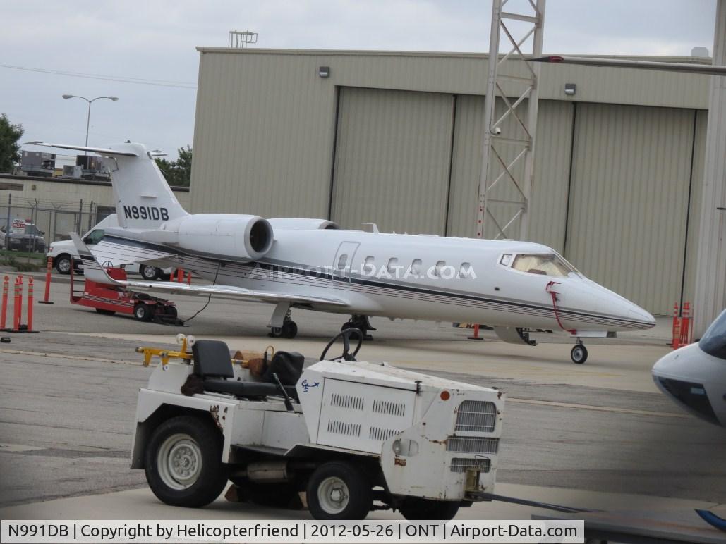 N991DB, 2000 Learjet 60 C/N 177, Has just been brought out and still hooked to the tow machine