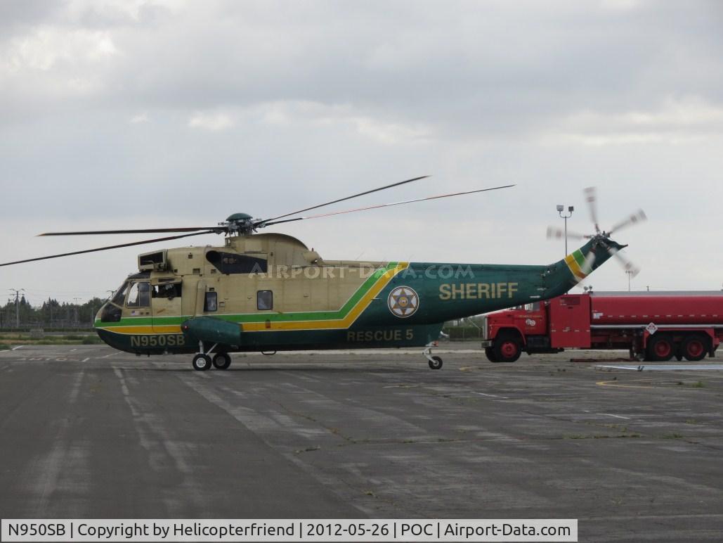N950SB, Sikorsky SH-3H Sea King C/N 61372, Patient secured and being tended to by Air Medic and taxiing out to taxiway Cocco