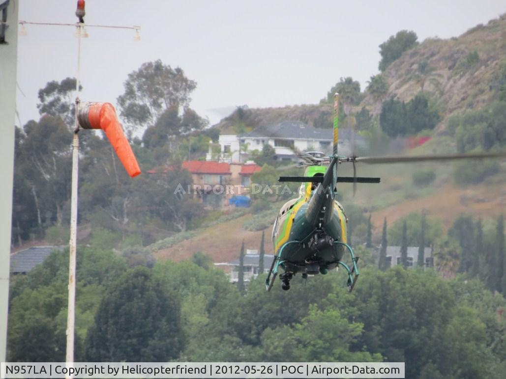 N957LA, 2010 Eurocopter AS-350B-2 Ecureuil Ecureuil C/N 7072, Nose into the wind and lifting off westbound from taxiway Sierra