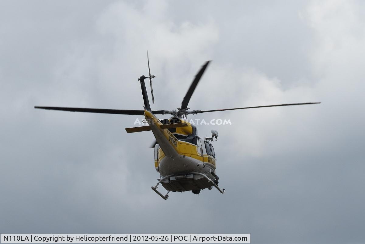N110LA, 2005 Bell 412EP C/N 36392, After receiving clearence, Copter 11 is heading north towards the mountains for a possible hoisting mission