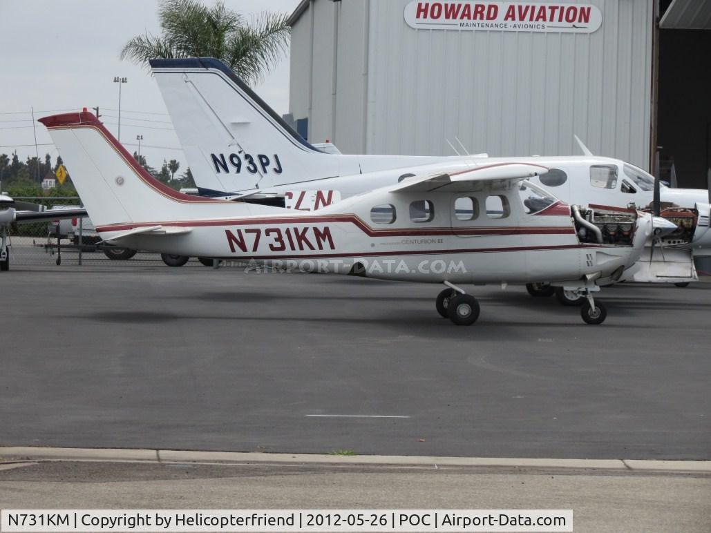 N731KM, Cessna P210N Pressurised Centurion C/N P21000484, Appears to be having engine work performed by Howard Aviation