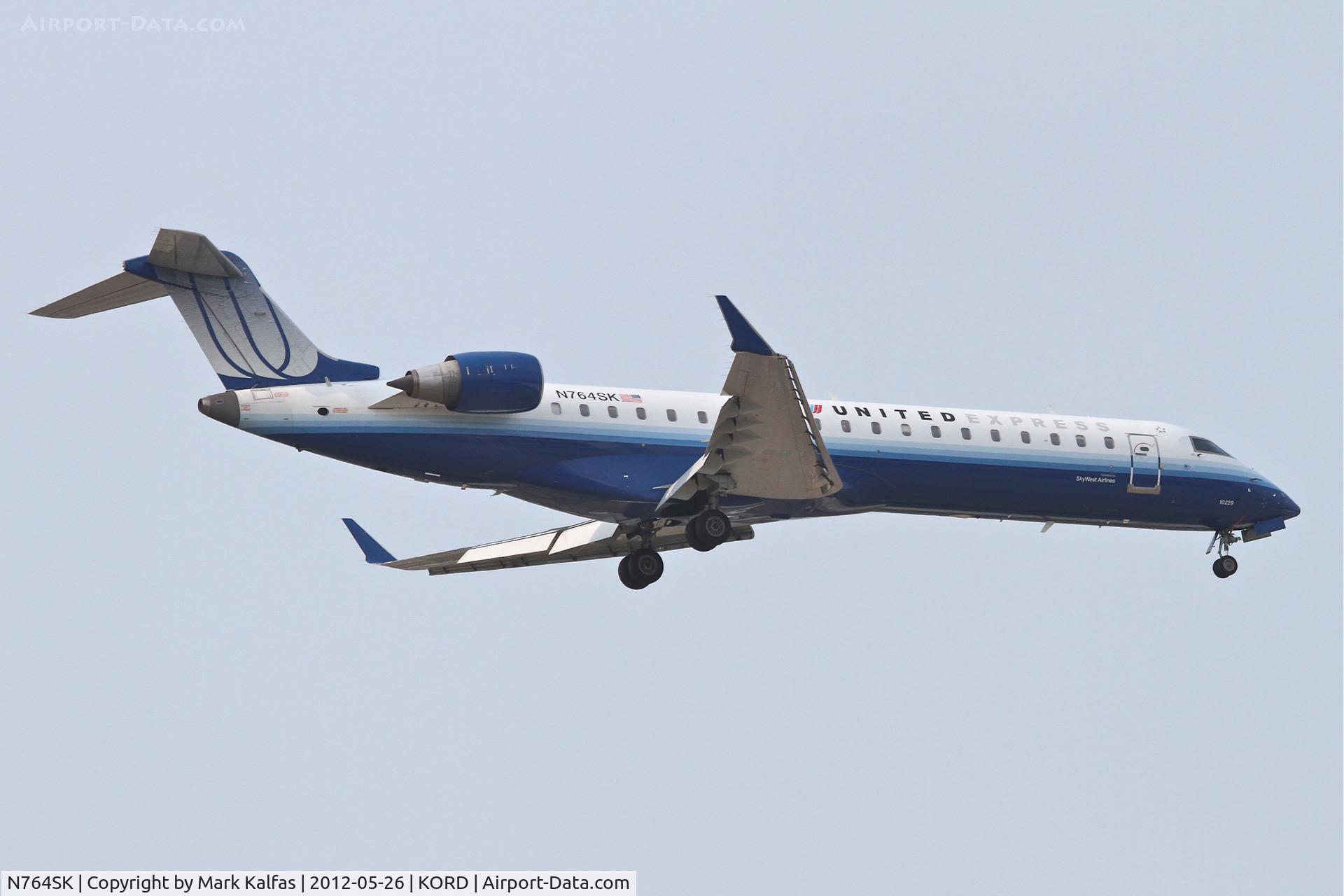 N764SK, 2005 Canadair CRJ-700 (CL-600-2C10) Regional Jet C/N 10229, SkyWest/United Express Bombardier CL-600-2C10, SKW5559 arriving from Calgary Int'l/CYYC, RWY 10 approach KORD.