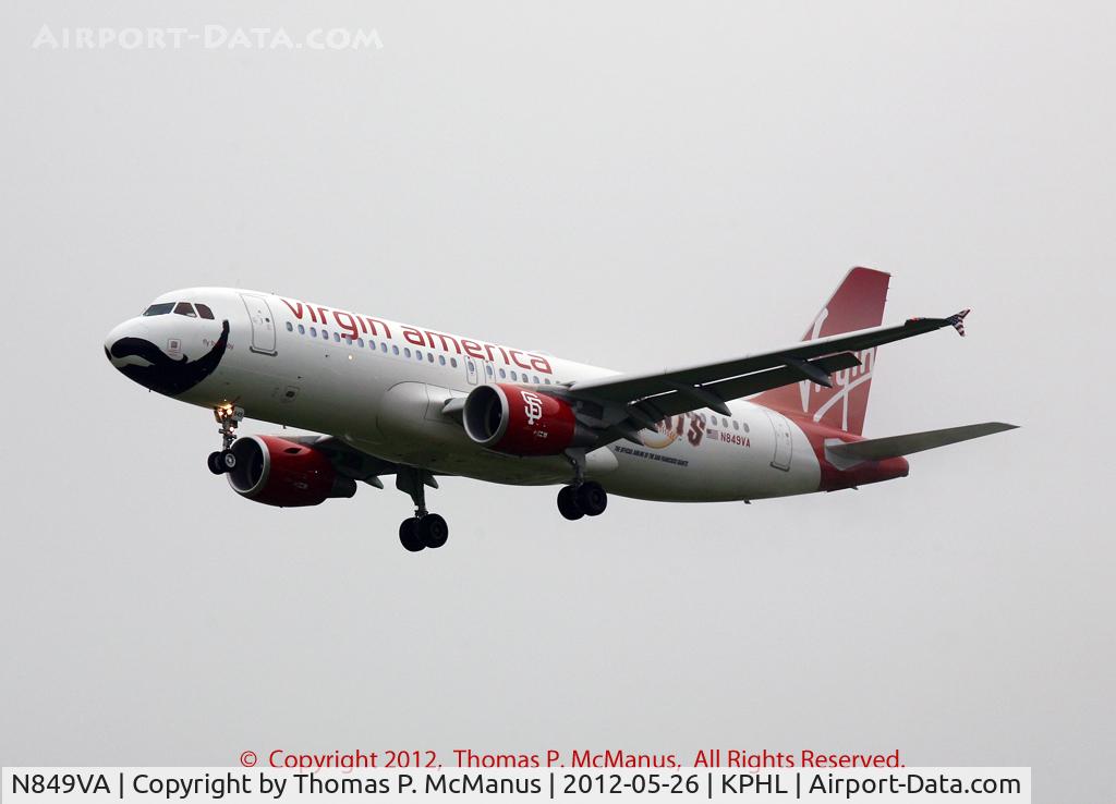 N849VA, 2011 Airbus A320-214 C/N 4991, Redwood 144 on short final for 27R at PHL.  A very early morning hazy arrival of a red-eye from KSFO.