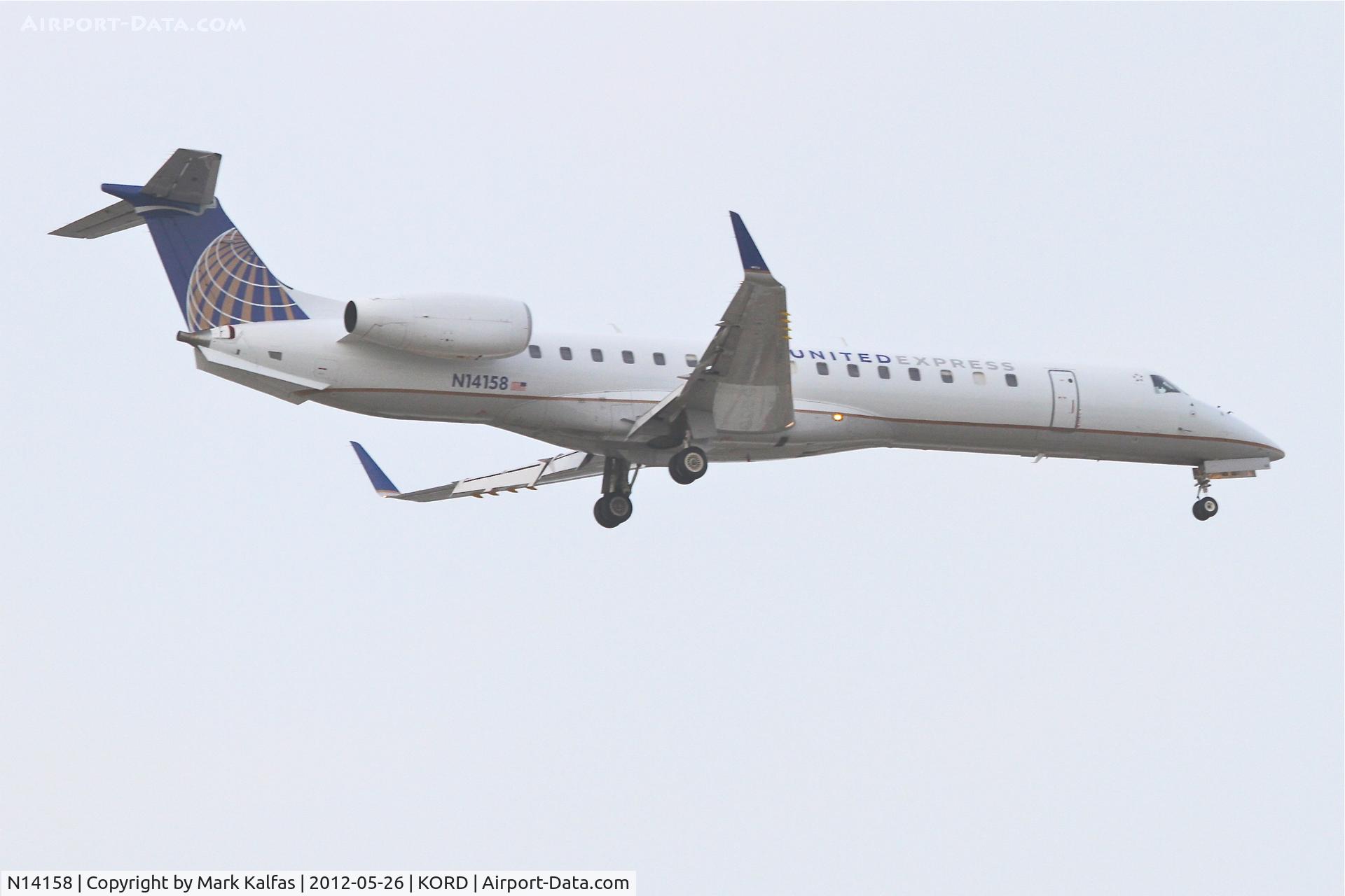 N14158, 2004 Embraer ERJ-145XR (EMB-145XR) C/N 145791, ExpressJet Airlines/United Express Embraer EMB-145XR, on approach for RWY 10 KORD.