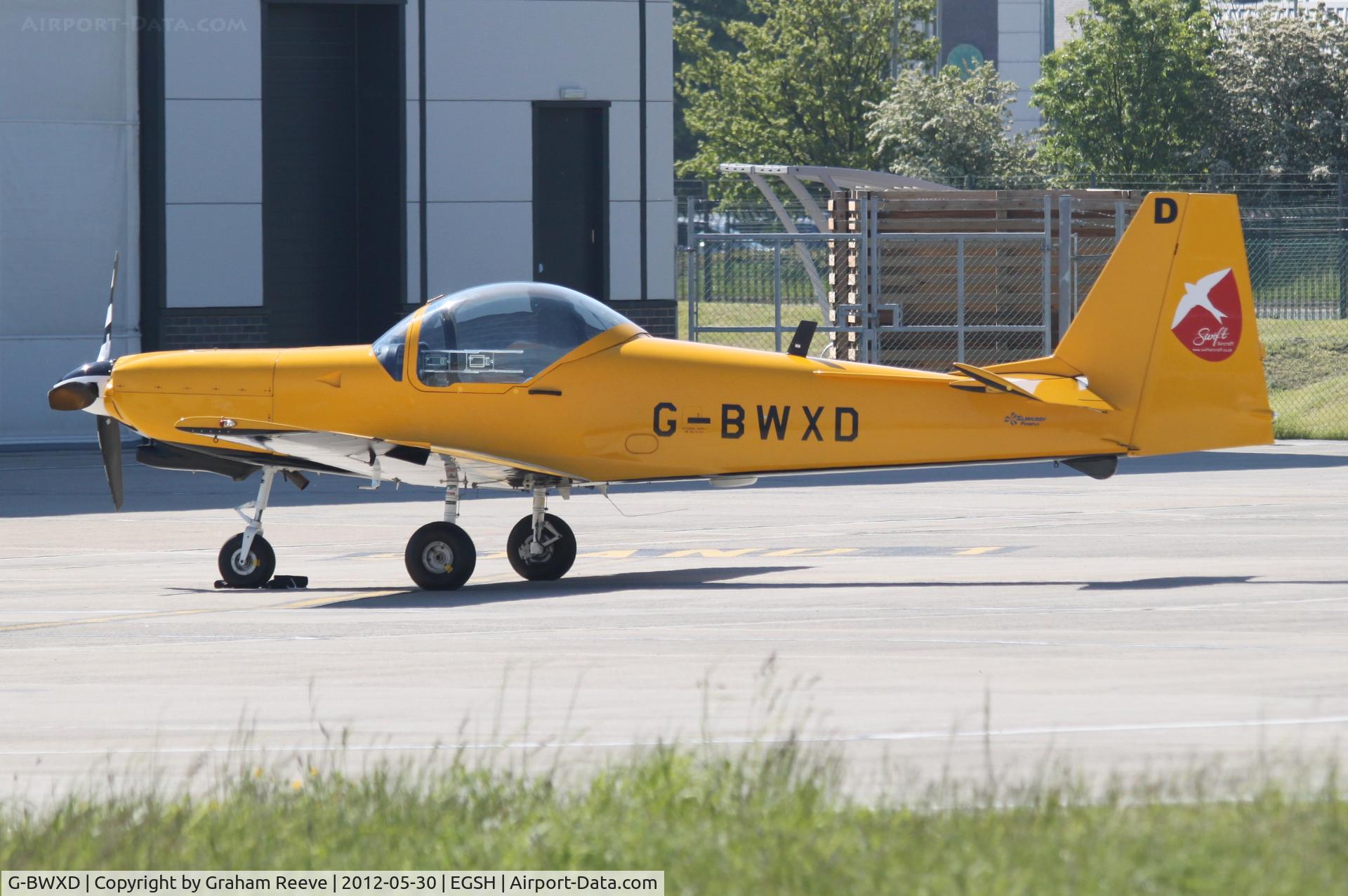 G-BWXD, 1996 Slingsby T-67M-260 Firefly C/N 2239, Parked at Norwich.