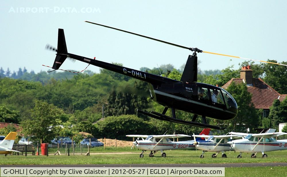 G-OHLI, 2005 Robinson R44 Clipper II C/N 10832, Originally with, Heli Air Ltd in August 2005, currently with and Trading as, NCS Partnership since September 2005.
Departing Denham as 