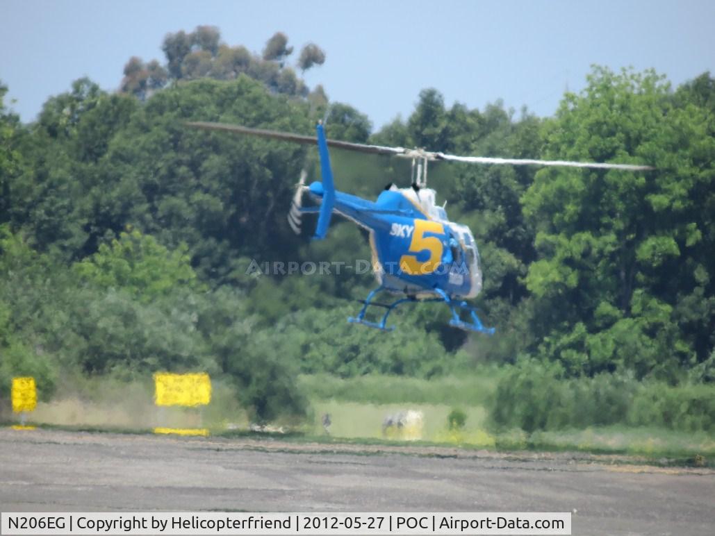 N206EG, 1975 Bell 206B JetRanger II C/N 1570, Lifting off from west helipad