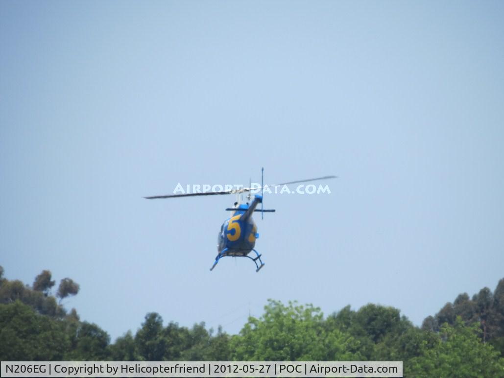 N206EG, 1975 Bell 206B JetRanger II C/N 1570, Lifting off anf flying west over Puddingstone Lake