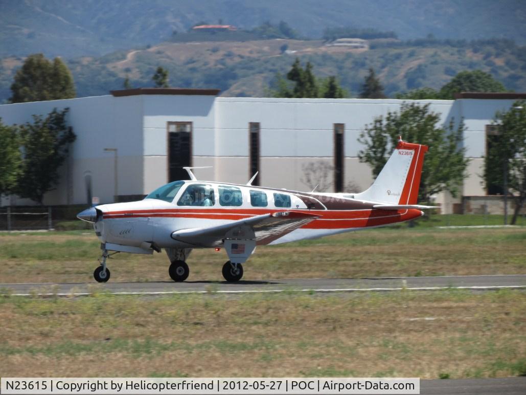 N23615, 1977 Beech A36 Bonanza 36 C/N E-1191, Starting roll after receiving permission to take off on 26L