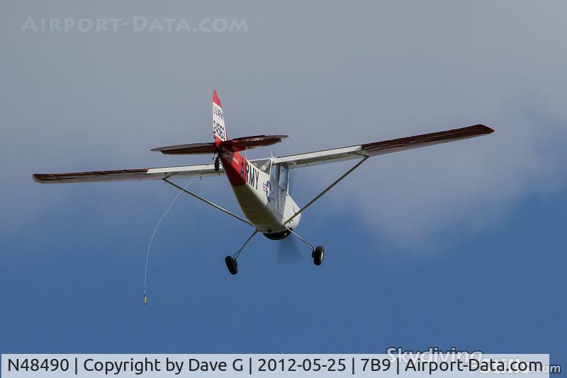 N48490, 1956 Cessna 305C (0-1E) C/N 24563, Trailing the grappling hook, ready to pick up a banner.